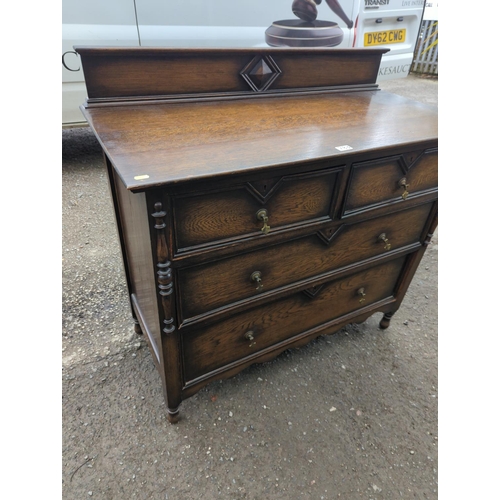 783 - Early C20 oak 2 over 2 chest of drawers. W107cm d49cm h102cm