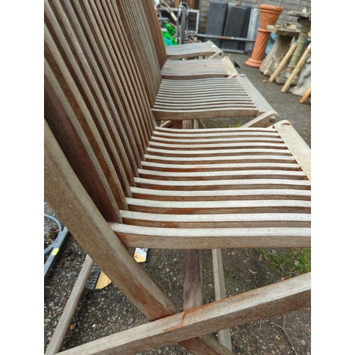 74 - 4 teak, folding , garden chairs.