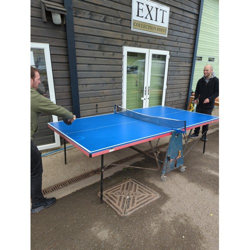 779 - Full sized Fold up Table tennis table with bats, ball and net. 