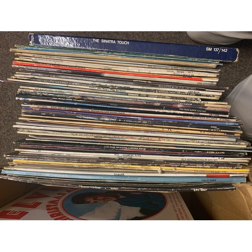 388 - Two boxes of vinyl Genesis, Billy Joel, Abba etc.