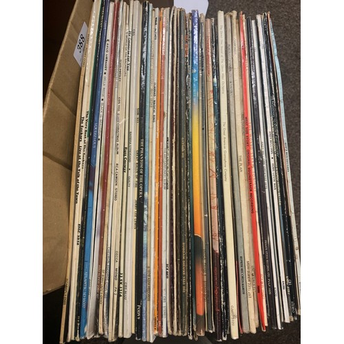 388 - Two boxes of vinyl Genesis, Billy Joel, Abba etc.