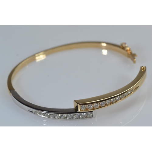 26 - 14ct bi-colour gold & diamond hinged bracelet, the diamonds together stated to weigh 1.80 carats... 