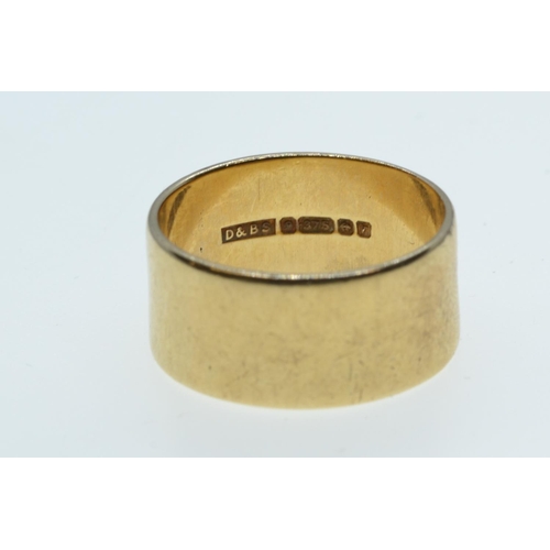 33 - 9ct gold wide band ring, size Q1/2, 5.4 grams