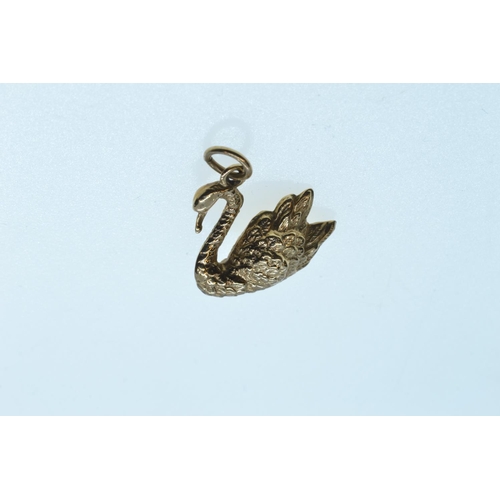 41 - 9ct gold swan charm and a 9ct gold, cultured pearl & sapphire pendant, gross weight 2 grams, tog... 