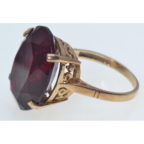 59 - 9ct gold & red stone ring, size O1/2, 5.96 grams