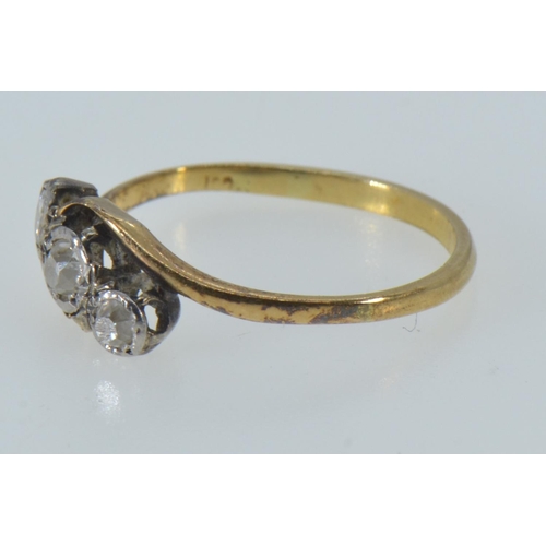 60 - Yellow metal & three stone diamond ring, marks rubbed but tests positive for 18ct gold, size O, ... 