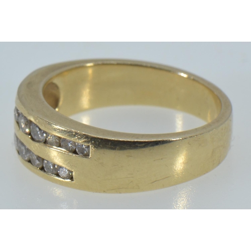 61 - 14ct gold & channel-set diamond ring, size R1/2, 8.16 grams