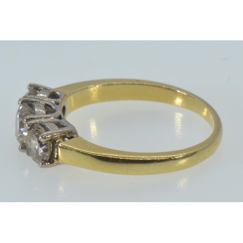 66 - 18ct gold & three stone diamond ring, the central diamond weighing approx. 0.50 carat, size R1/2... 