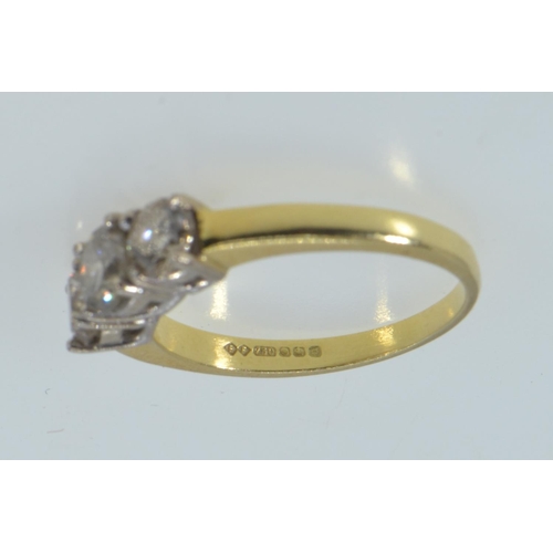 66 - 18ct gold & three stone diamond ring, the central diamond weighing approx. 0.50 carat, size R1/2... 