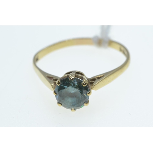 69 - 9ct gold & blue stone ring, size O1/2, 1.57 grams