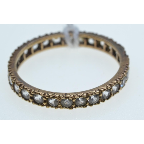 71 - 9ct gold & white stone eternity ring, size T, 2 grams