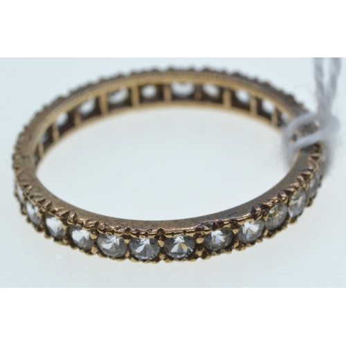 71 - 9ct gold & white stone eternity ring, size T, 2 grams