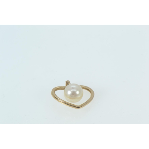 90 - Two 14ct gold pendants, one set with a smokey quartz, the other heart-shaped with a cultured pearl, ... 