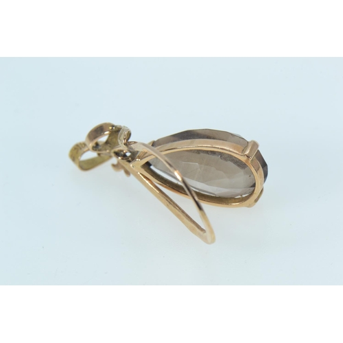 90 - Two 14ct gold pendants, one set with a smokey quartz, the other heart-shaped with a cultured pearl, ... 