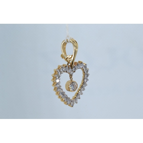 93 - 14ct gold & diamond heart-shaped pendant, the open work pendant set with brilliant-cut diamonds ... 