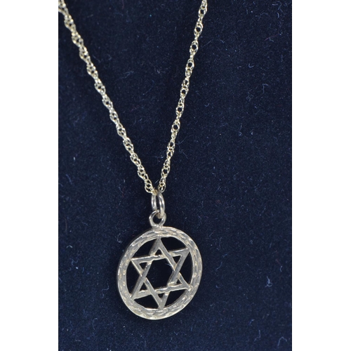 96 - Yellow metal Star of David pendant & a 9ct gold neck chain, pendant tests positive for 9ct gold,... 