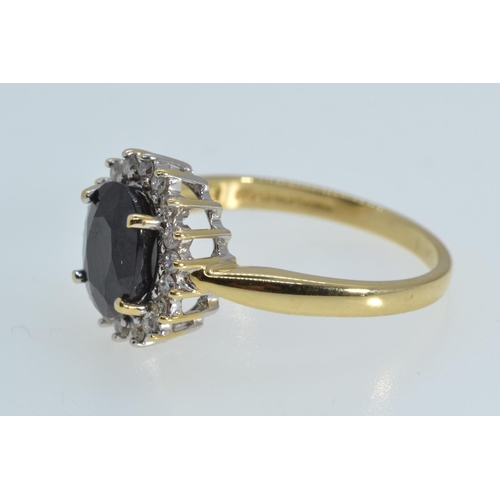 105 - 18ct gold, sapphire & diamond cluster ring, size R, 4.59 grams