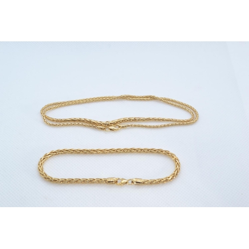 118 - 9ct gold spiga link neck chain & bracelet, the chain of graduated form, circumference 455mm &... 