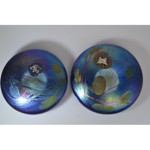 640 - Two John Ditchfield Glasform iridescent glass lily pad paperweights with applied hallmarked silver b... 