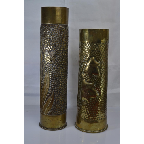 644 - Two WWI trench art vases, 35cm height depicting tulips and 29.5cm height depicting ivy