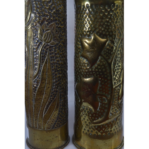 644 - Two WWI trench art vases, 35cm height depicting tulips and 29.5cm height depicting ivy