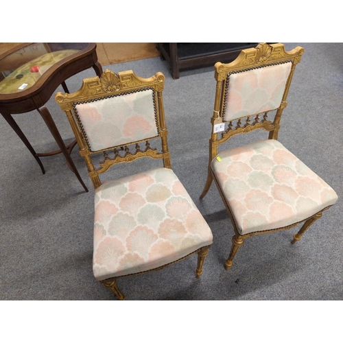 740 - Pair of Italian Neoclassical style gilt hall chairs, with tapered fluted legs, and later reupholster... 