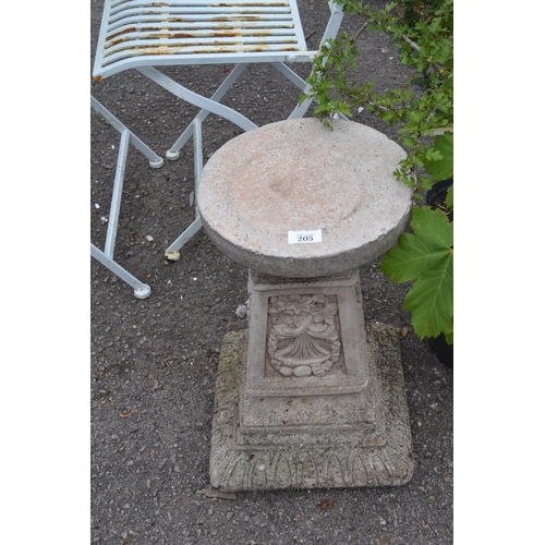 205 - Concrete pedestal with circular top. H49cm. D27cm.