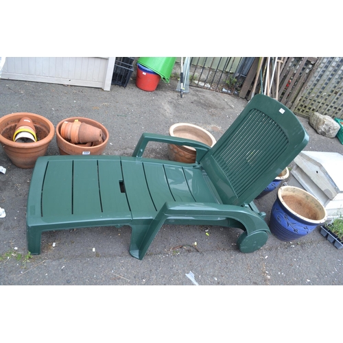 253 - Green plastic sunlounger. No cushion.