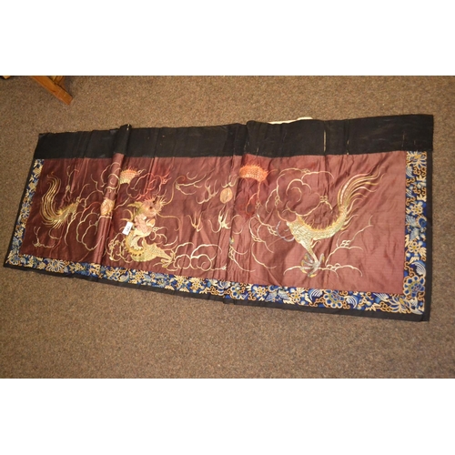 545 - Antique Chinese silk embroidered banner, with plum ground depicting traditional dragons, approx 182c... 