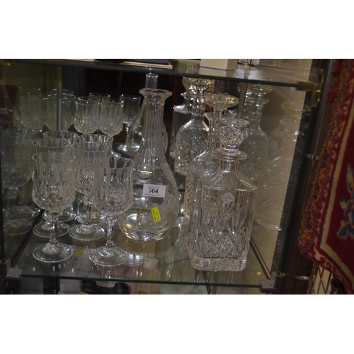 564 - Three decanters, inc. one Edinburgh crystal, another missing stopper, & a set of six wine glasse... 