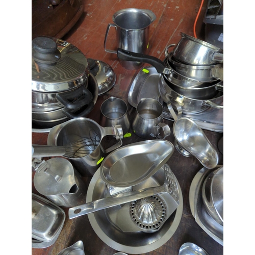 272 - Large quantity of stainless steel kitchen ware etc.