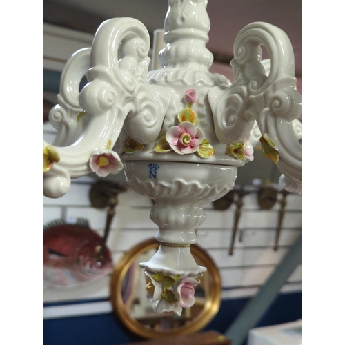 395b - 'Capo-di-Monte' style porcelain four branch chandelier, floral encrusted, with Naples mark