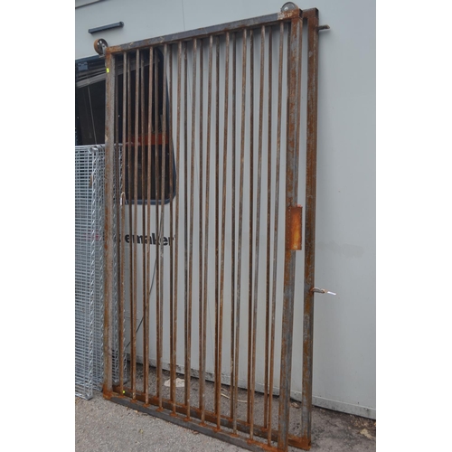 129 - Wrought iron door cover. W125cm H209cm