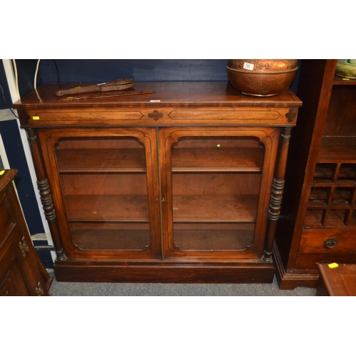 756 - Glazed fronted book case with carved pillar detail W114cm D33.5cm H96.5cm 