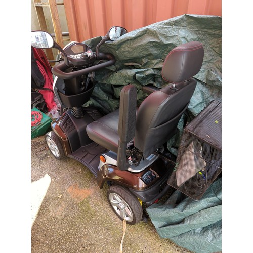 97 - Kymco mobility scooter. Very clean hardly used condition. With charger, manual & waterproof dust... 