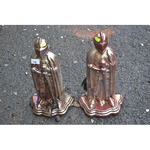 79 - Pair of metal knight companion holders. H40cm