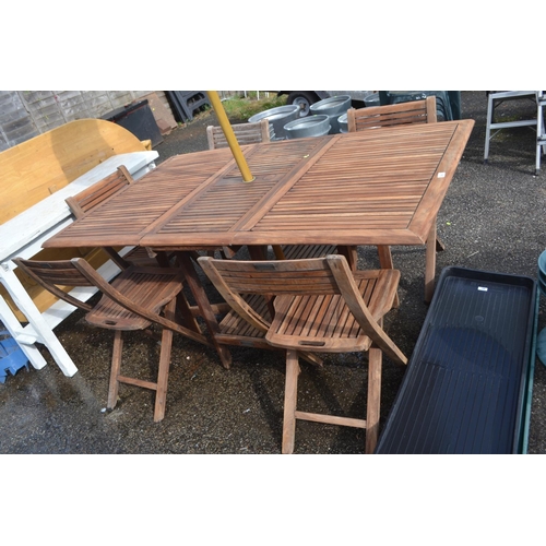 100 - Folding teak garden table with 5 folding teak chairs. L161cm W98.5cm H76cm. Table folds down and cha... 