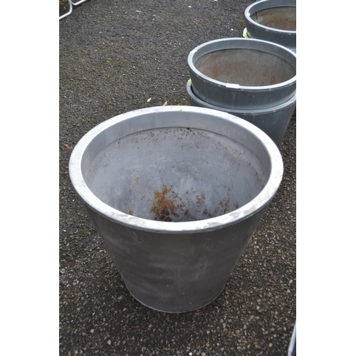 104 - Large circular tapered plant pot in metal. D51cm H41cm