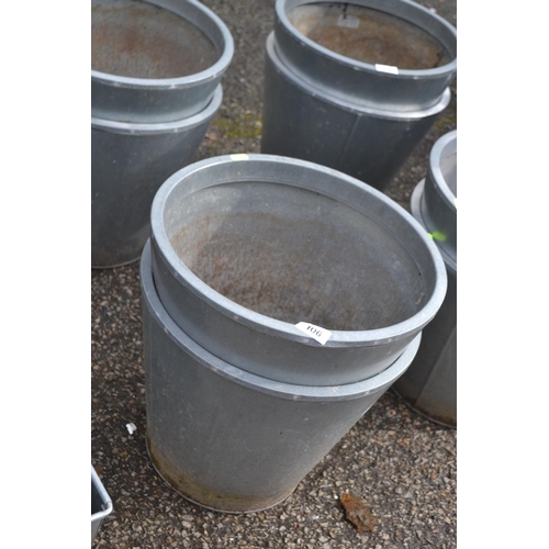 106 - 2 circular tapered metal plant pots. D38cm H33cm