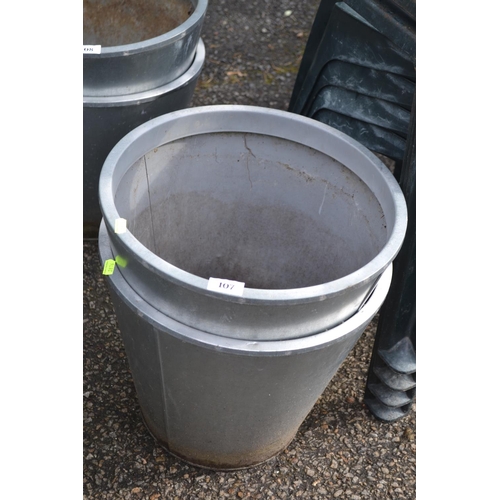 107 - 2 circular tapered metal plant pots. D38cm H33cm