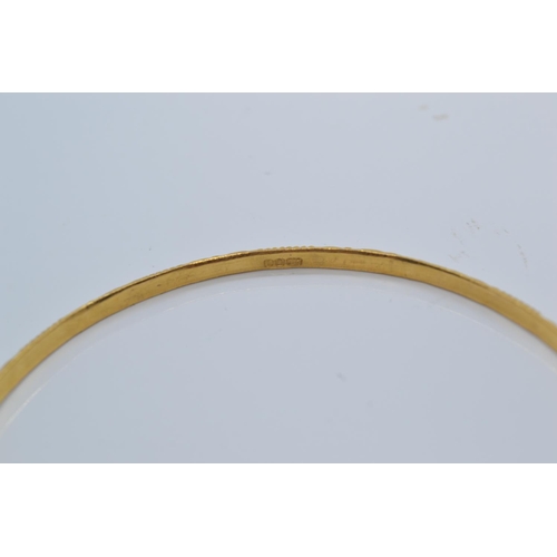 7 - 22ct gold bangle, inner diameter 64mm, 10.71 grams