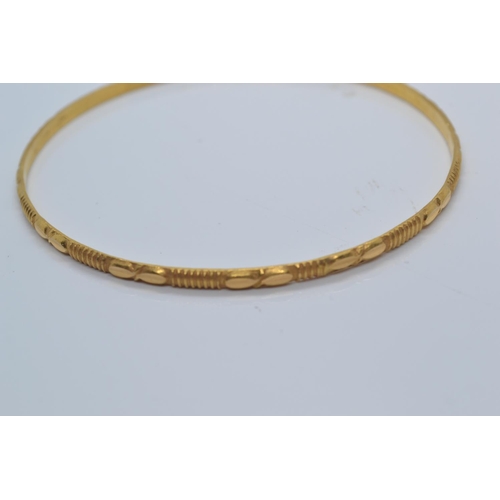 7 - 22ct gold bangle, inner diameter 64mm, 10.71 grams