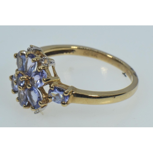 11 - 9ct gold, tanzanite & diamond cluster ring, size M1/2, 2.25 grams