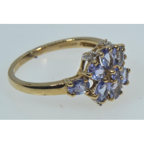 11 - 9ct gold, tanzanite & diamond cluster ring, size M1/2, 2.25 grams