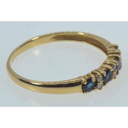 31 - Yellow metal, sapphire & diamond half hoop ring, hallmarks rubbed but tests positive for 18ct go... 