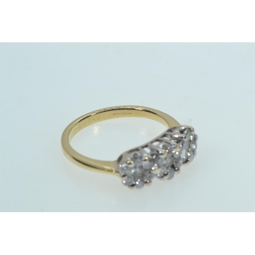 53 - 18ct gold triple cluster ring, size L1/2, 3.7 grams