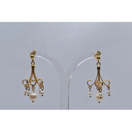 60 - Pair of 9ct gold & pearl pendant earrings, length 35mm, with post fittings, gross weight 3.89 gr... 