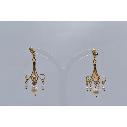 60 - Pair of 9ct gold & pearl pendant earrings, length 35mm, with post fittings, gross weight 3.89 gr... 