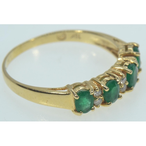 61 - 18ct gold, emerald & diamond half hoop ring, size Q, 2.9 grams