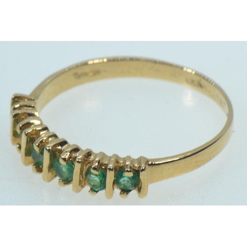 63 - 14ct gold & emerald half hoop ring, size Q, 2.56 grams